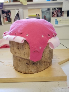 ah, a prototype for a German slashed coif. I think this will do. this…