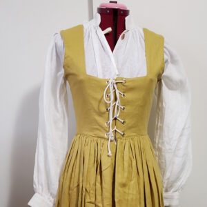 image is a gown on a dress form